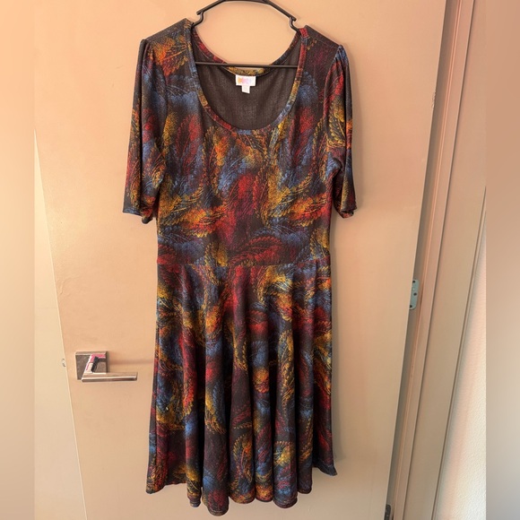 LuLaRoe Dresses & Skirts - Colorful Feather Patterned Women's LulaRoe Nicole Dress